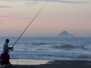 Fishing at Waiotahe Beach